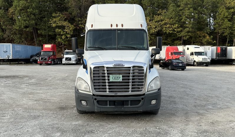 2017 Freightliner Cascadia 125 with 2003 Mack End Dump Trailer full