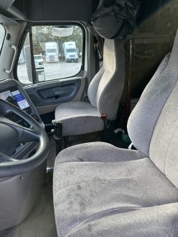 2017 Freightliner Cascadia 125 with 2003 Mack End Dump Trailer full