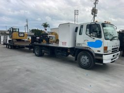 2007 Mitsubishi FM 330 with, 2022 Hooper Equipment Trailer, 22.5 Ton, Gooseneck and 2006 PJ Dump Hurricane Clean Up Trailer, 10 Ton, Gooseneck. full