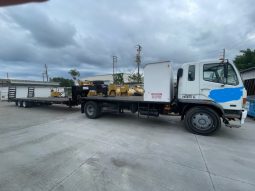 2007 Mitsubishi FM 330 with, 2022 Hooper Equipment Trailer, 22.5 Ton, Gooseneck and 2006 PJ Dump Hurricane Clean Up Trailer, 10 Ton, Gooseneck. full