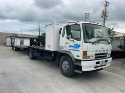 2007 Mitsubishi FM 330 with, 2022 Hooper Equipment Trailer, 22.5 Ton, Gooseneck and 2006 PJ Dump Hurricane Clean Up Trailer, 10 Ton, Gooseneck. full