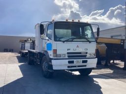 2007 Mitsubishi FM 330 with, 2022 Hooper Equipment Trailer, 22.5 Ton, Gooseneck and 2006 PJ Dump Hurricane Clean Up Trailer, 10 Ton, Gooseneck. full