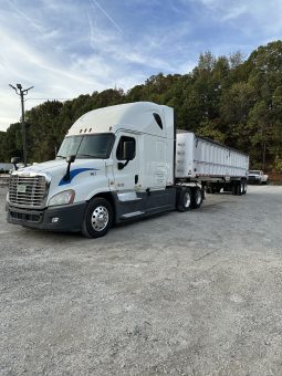 2017 Freightliner Cascadia 125 with 2003 Mack End Dump Trailer full