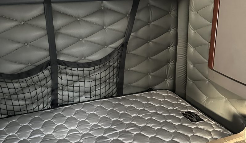 2017 Freightliner Cascadia 125 with 2003 Mack End Dump Trailer full