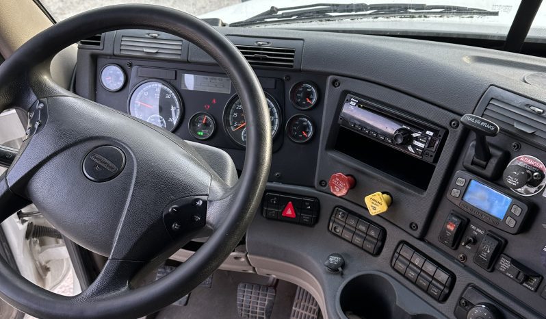 2017 Freightliner Cascadia 125 with 2003 Mack End Dump Trailer full