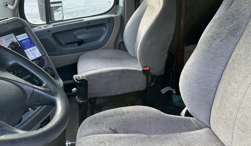 2017 Freightliner Cascadia 125 with 2003 Mack End Dump Trailer full